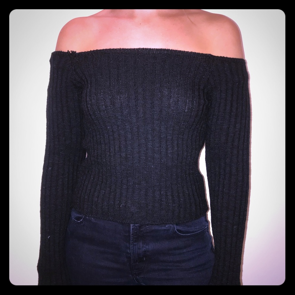 Off the shoulder black sweater top.